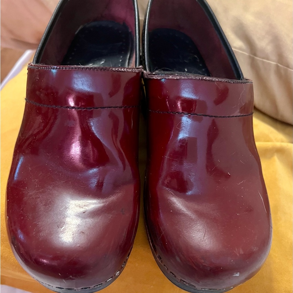 Red Dansko clogs, size 9